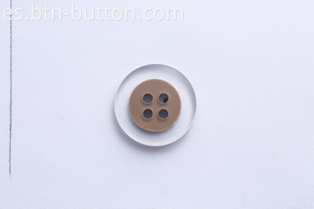 Transparent buttons on the nest surface for trench coats